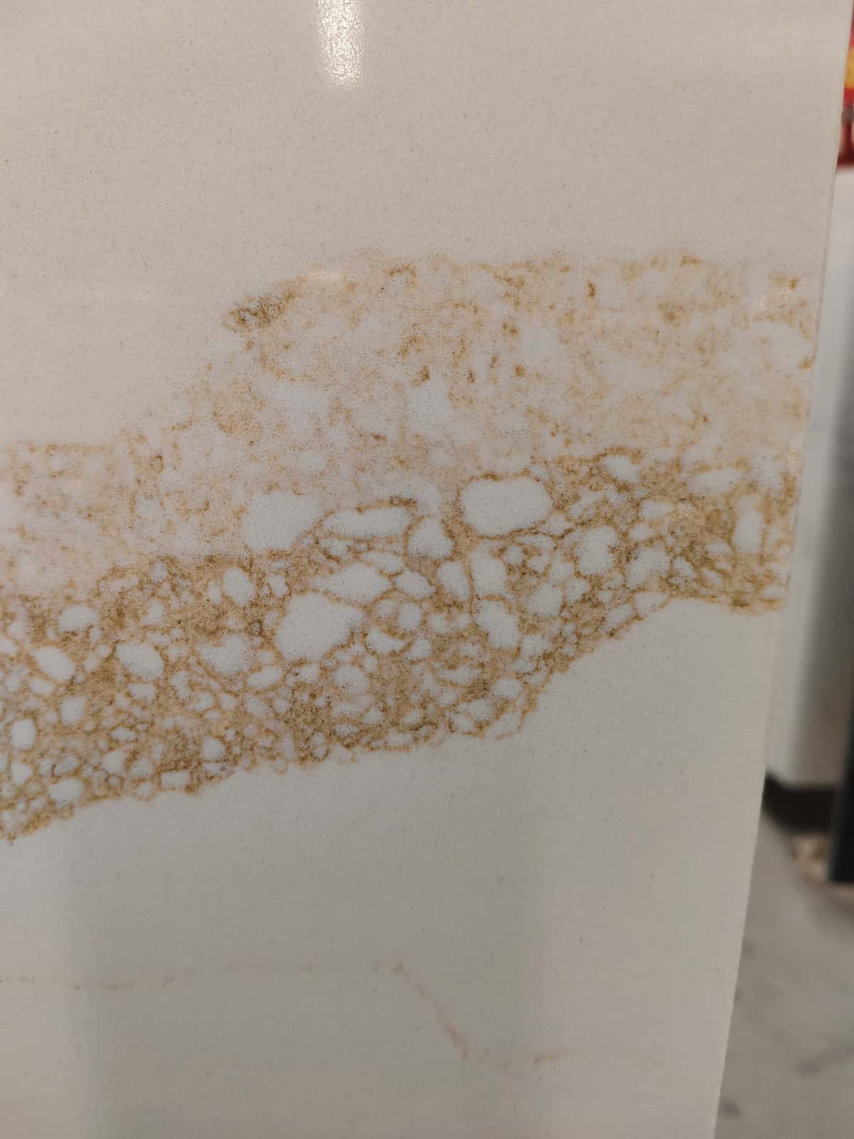 White quartz slab with gold veining used for a kitchen island project in the Middle East