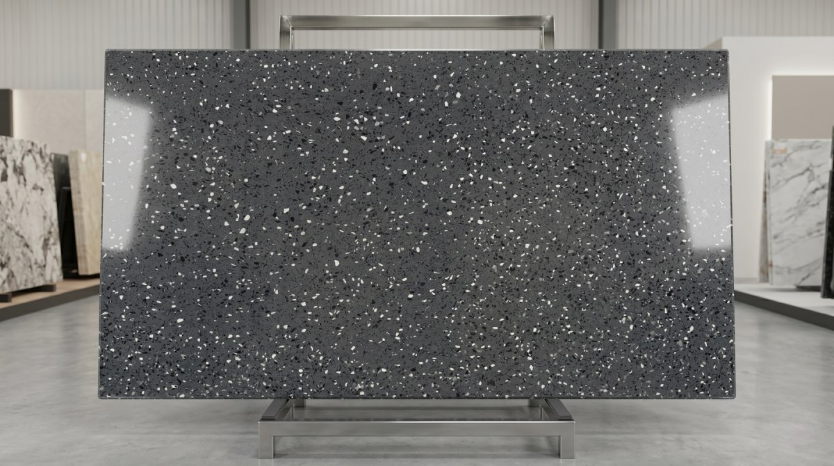 grey-compact-marble-slab-black-white-chips Grey compact marble slab with dense black white and grey chips