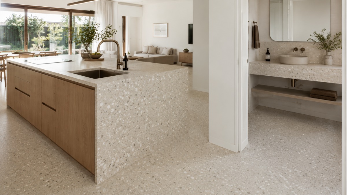 Warm neutral terrazzo used for residential flooring kitchen island and bathroom vanity
