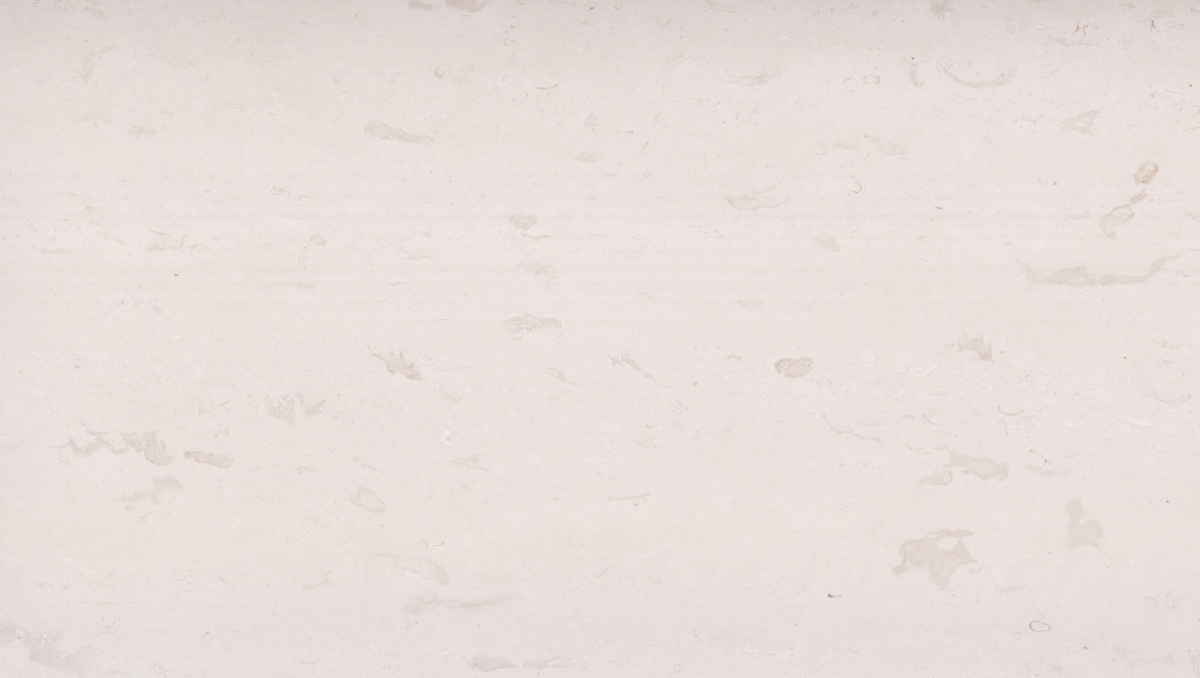 benin-white-limestone-surface-close-up Close-up of warm white limestone surface with faint beige-grey markings