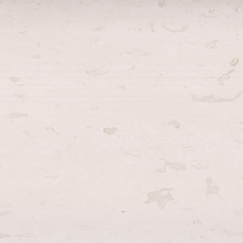 Benin White Limestone with a warm white background and faint beige-grey fossil-like markings