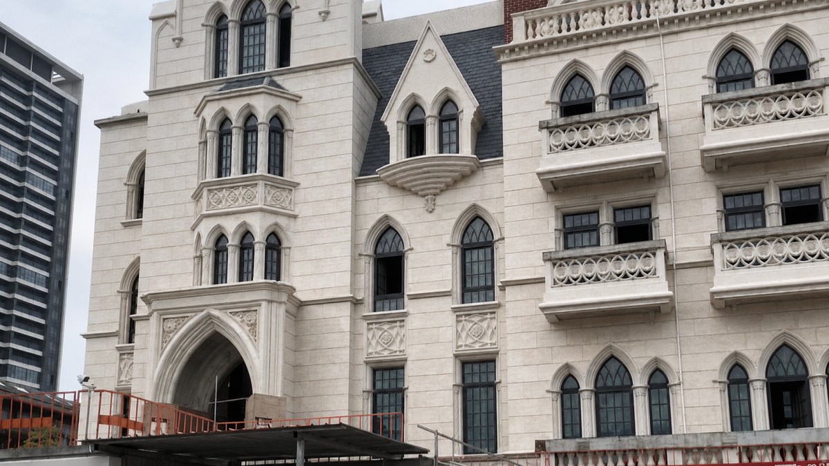  Moonlight Beige Limestone facade with flat panels, window surrounds and layered architectural details